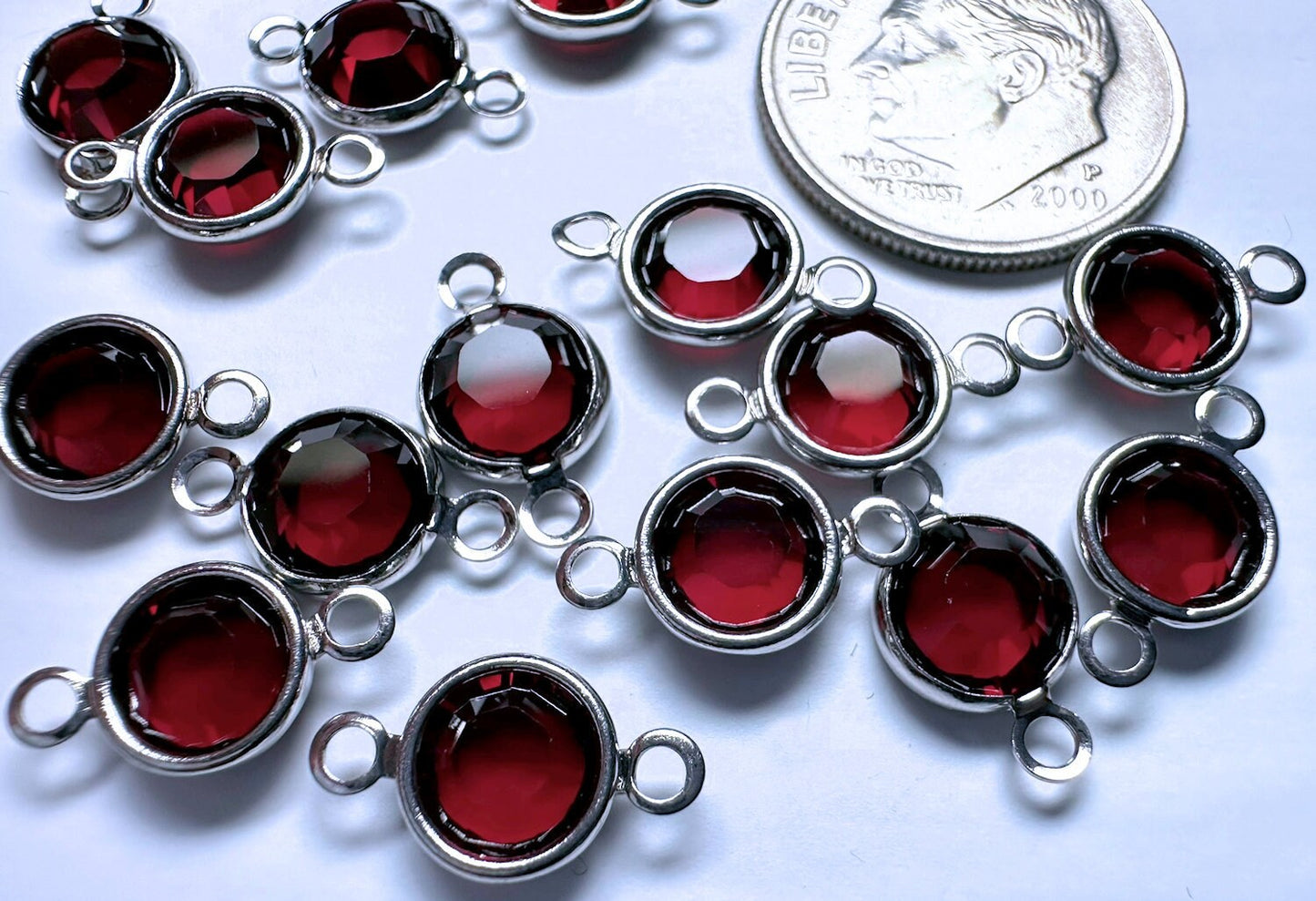 Silverlinks
with red stones on a white background