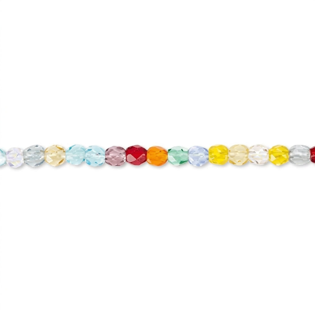 A strand of faceted round beads in a rainbow color sequence, including light blue, yellow, orange, red, pink, and clear beads, laid horizontally on a white background.