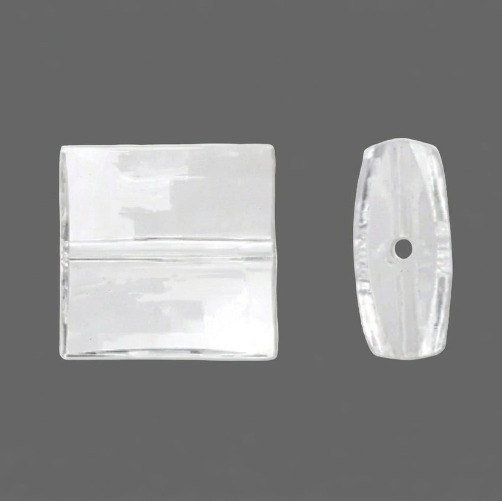 Two clear faceted ACRYLIC beads on a plain white background, one shown from the front and one from the side to demonstrate the center hole.