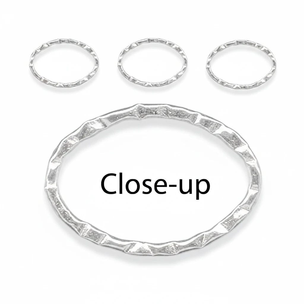 Three textured silver bangles shown on a plain white background, with a large close-up view of the largest bangle and the text 'Close-up' centered inside it.