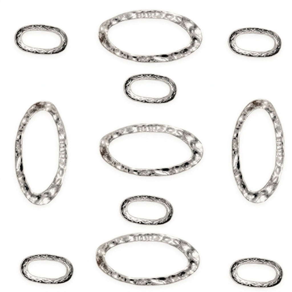 A set of silver-toned oval and circular rings with a textured, hammered edge, arranged on a white background with the text 'The Mystical Garden Path' printed below.