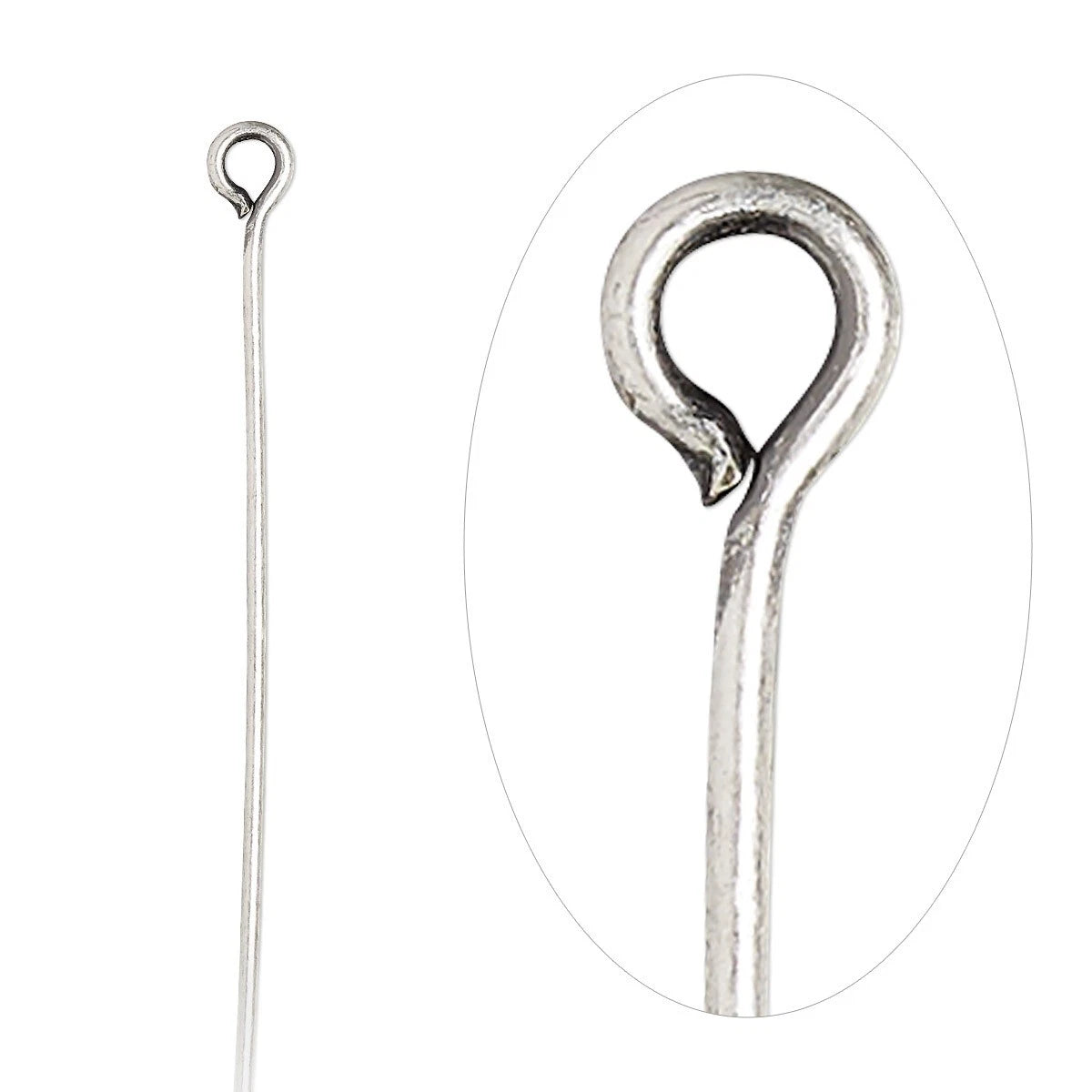 A silver-toned metal loop pin with a long straight stem and a curved hook end, shown alongside a circular close-up inset of the hook detail on a white background.