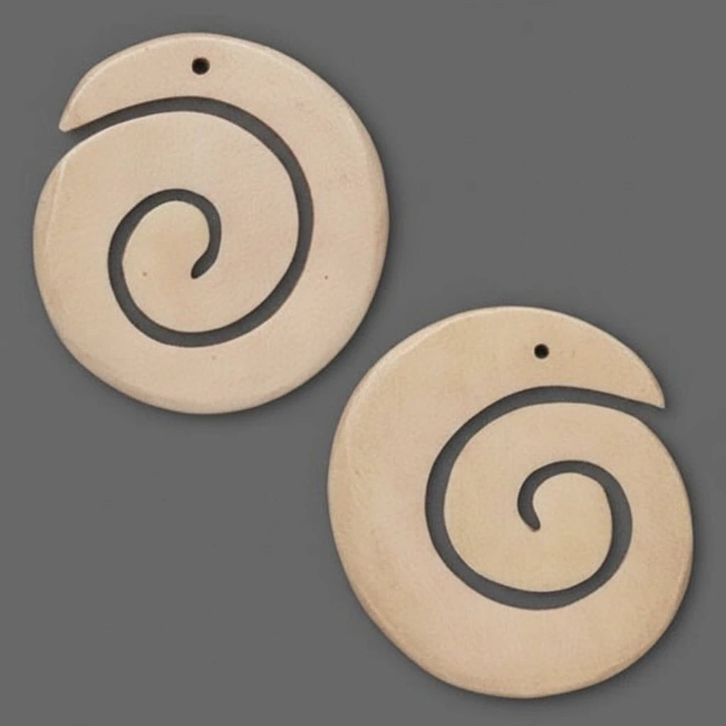 Two circular natural wood earrings with spiral cutouts, displayed on a solid dark gray background.
