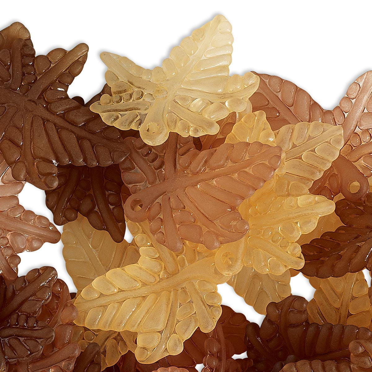 A pile of translucent leaf-shaped beads in various shades of amber, tan, and dark brown, arranged on a white background.