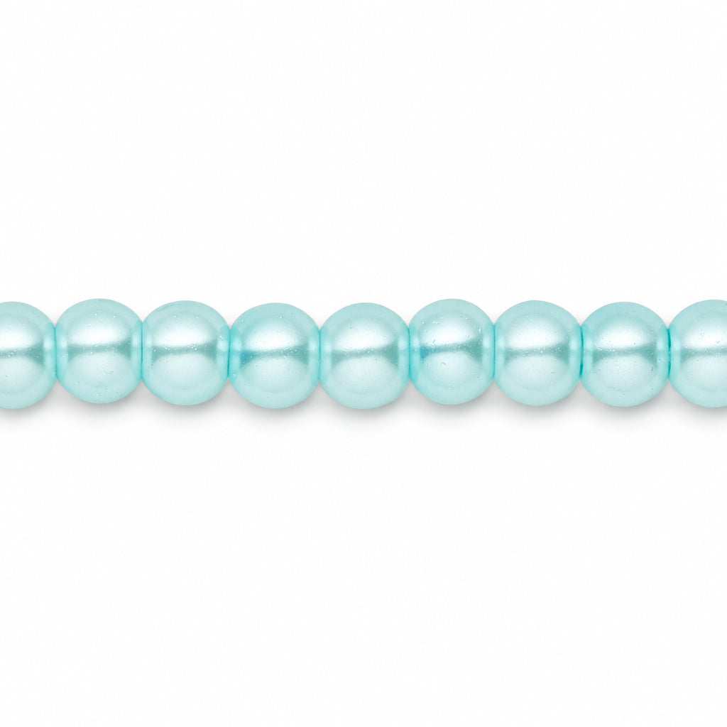 A close-up horizontal line of glossy, light aqua blue pearl-like beads on a plain white background.