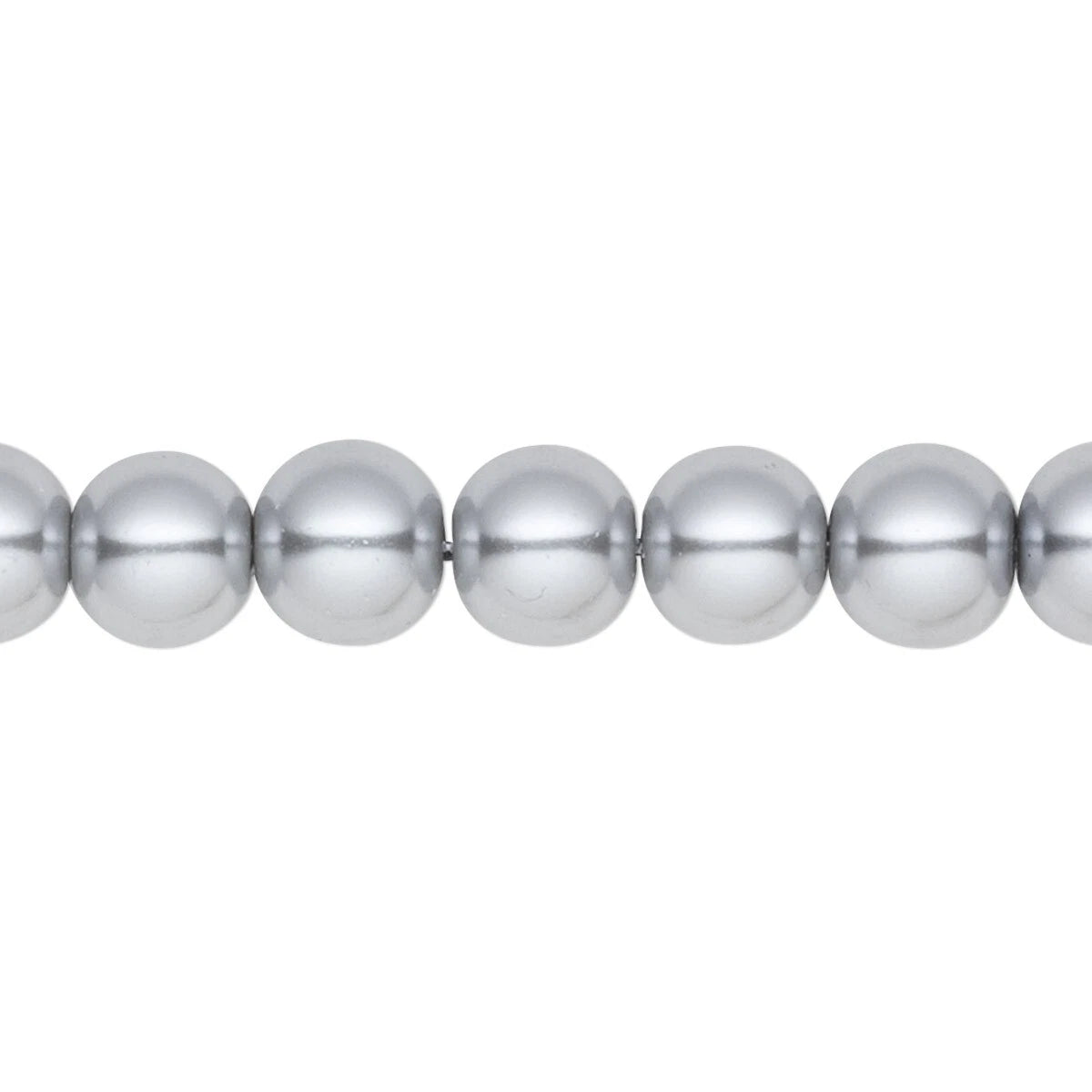 A close-up of a strand of metallic silver round beads on a plain white background.