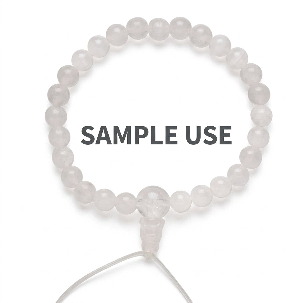 A translucent white beaded bracelet with a clear connector and cord, shown on a plain white background with black text reading '*Sample Usage IV'.