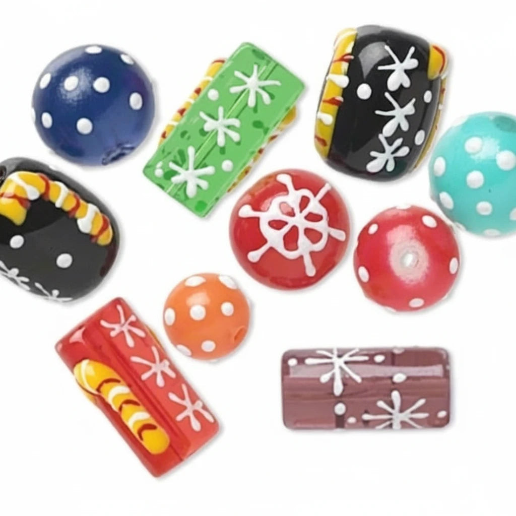 A collection of colorful decorative beads with various patterns including polka dots, white starbursts, and stripes, shown on a plain white background.
