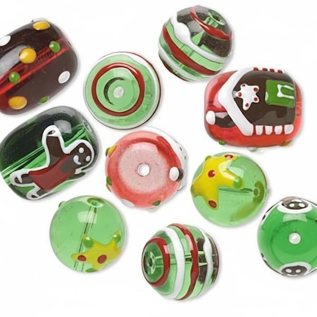 A set of colorful glass lampwork beads with various patterns including stripes, dots, and hand-painted designs in green, red, black, white, and yellow on a plain white background.