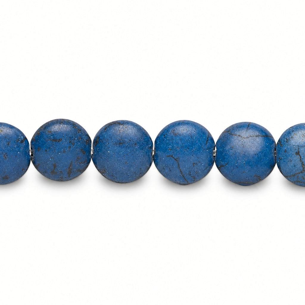 A close-up horizontal view of several round blue beads with natural dark veining, shown against a plain white background.