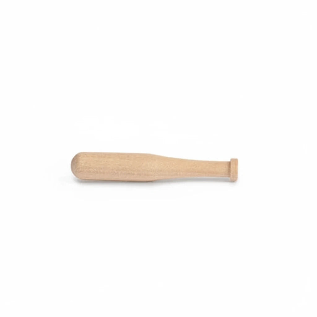 Brush with wooden handle and white bristles on a white background