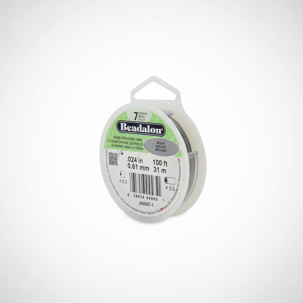 Spool of Beadalon bead stringing wire with label on a white background
