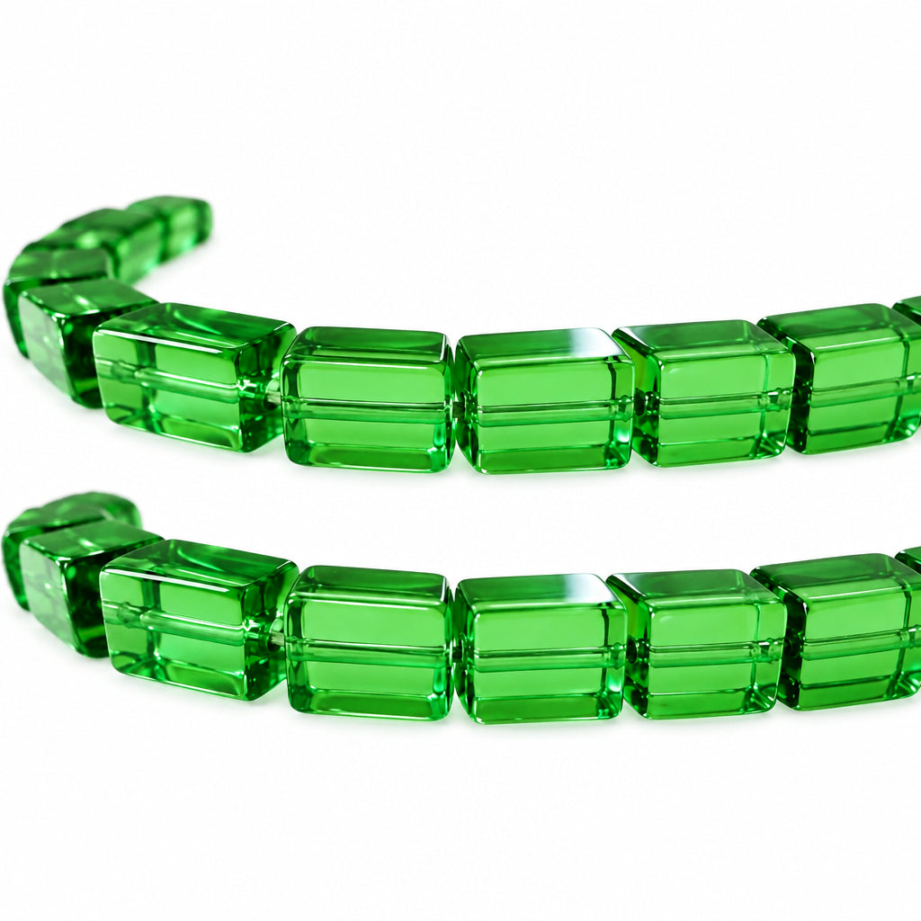 A close-up of a green translucent beads shown against a plain white background.