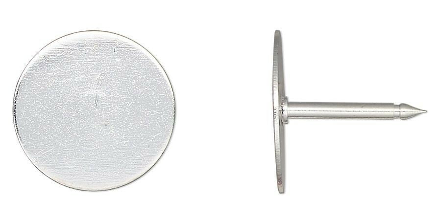 Metallic pushpin with round head and pointed tip on a white background