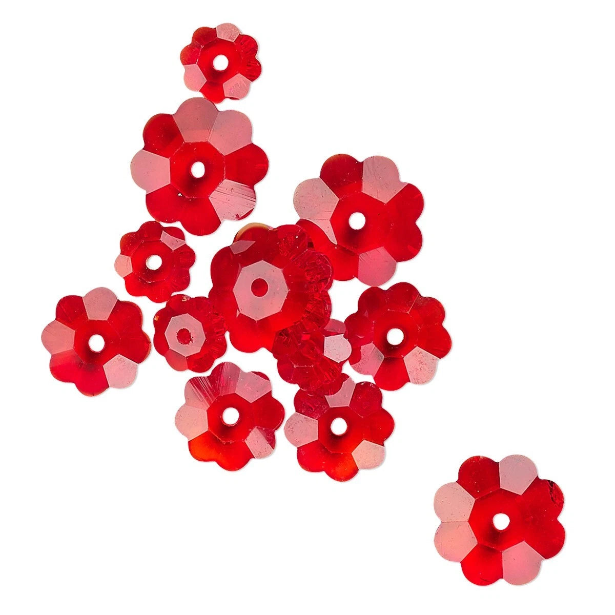 Red flower-shaped beads on a white background