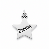 A silver star-shaped pendant charm with the word 'Dream' engraved in black on its center, shown on a clean white background.