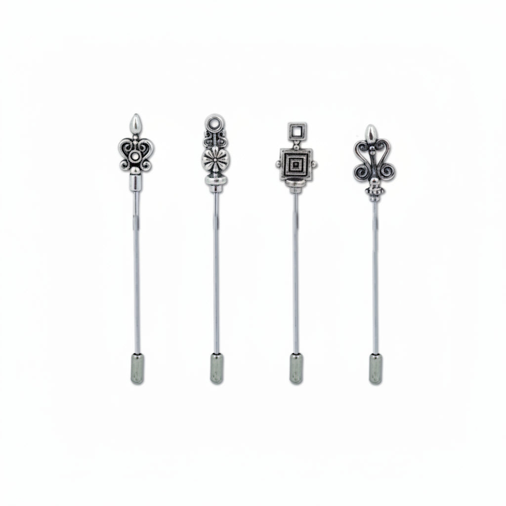 Four silver-toned decorative tie bars with ornate filigree and geometric designs, displayed vertically against a plain white background.
