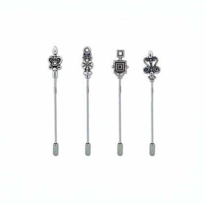 Four silver-toned decorative tie bars with ornate filigree and geometric designs, displayed vertically against a plain white background.
