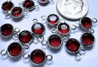 Silverlinks
 with red stones on a white background