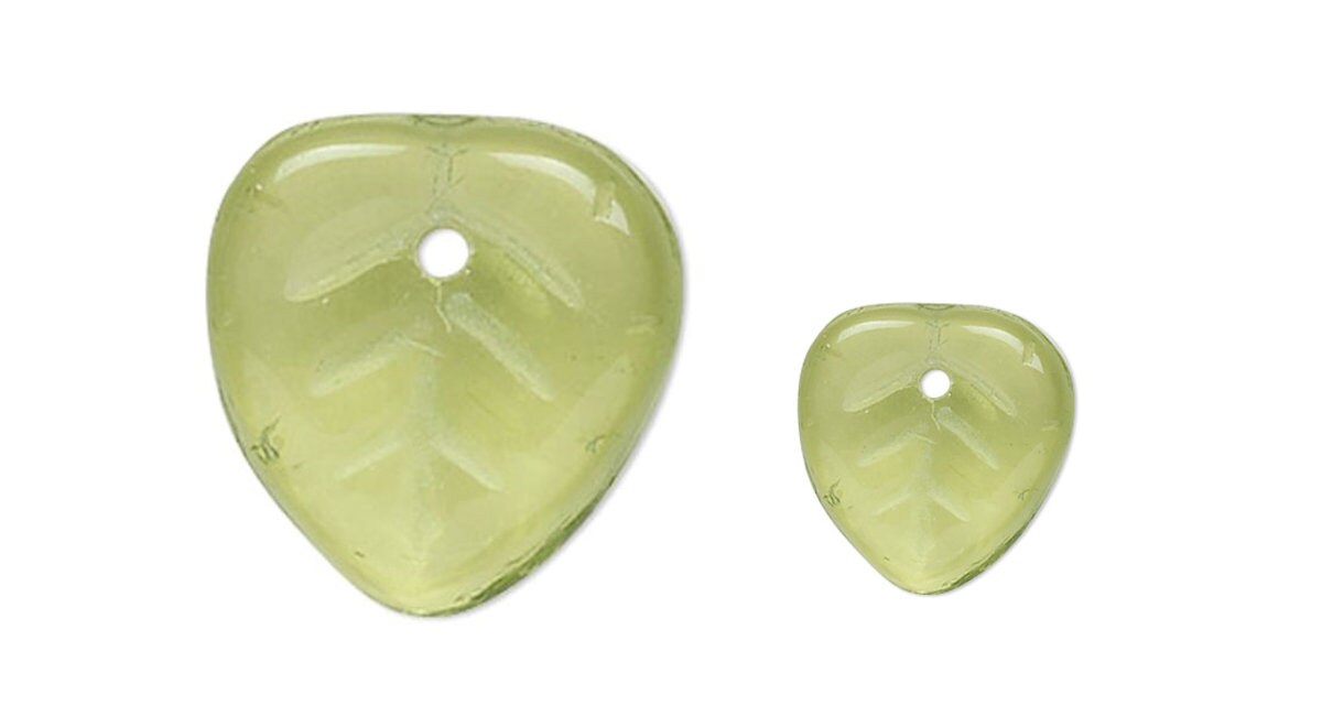 Two green leaf-shaped pendants on a white background