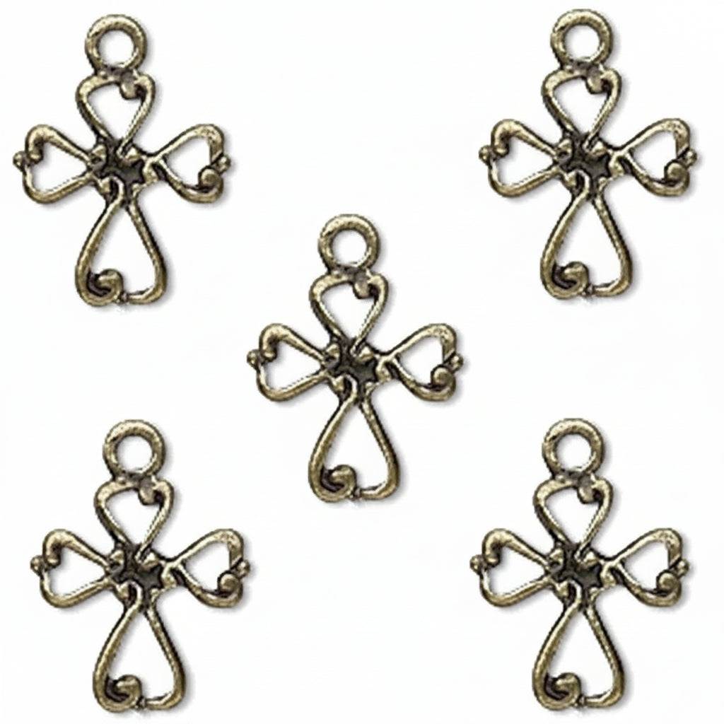 Five antique bronze cross-shaped jewelry charms with loop tops, arranged on a plain white background.