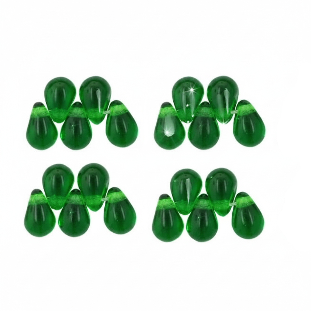 Six pairs of glossy green teardrop-shaped beads strung on thin white cords, arranged in a grid on a plain white background.