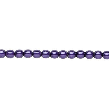 A single strand of glossy, dark purple oval beads aligned horizontally against a plain white background.