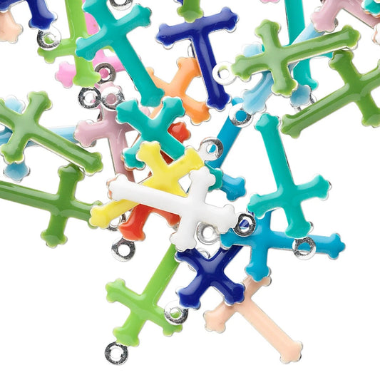 A pile of colorful snowflake-shaped jewelry charms with silver metal loops, shown on a solid white background.