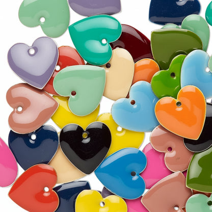 A pile of glossy, heart-shaped craft buttons in a variety of vibrant colors including teal, blue, green, pink, orange, yellow, black, and purple, arranged on a clean white background.