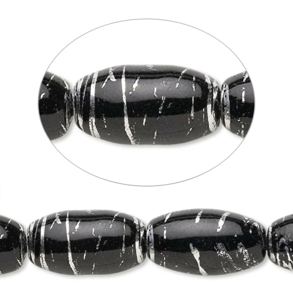 Black GLASS beads with white veining, shown in a close-up circular inset and along a strand against a white background.