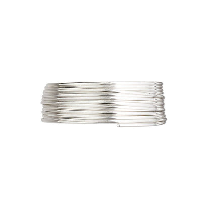 A wide silver bangle cuff bracelet with multiple parallel wrapped bands, shown on a plain white background.