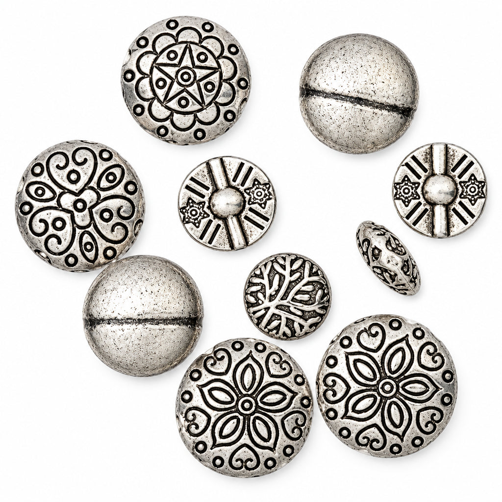 A set of silver-toned decorative beads with various ornate floral, geometric, and swirl patterns, shown on a plain white background.