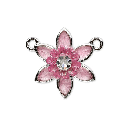 A pink and silver flower-shaped jewelry charm with a clear rhinestone in the center and two hanging loops on the sides, shown on a plain white background.