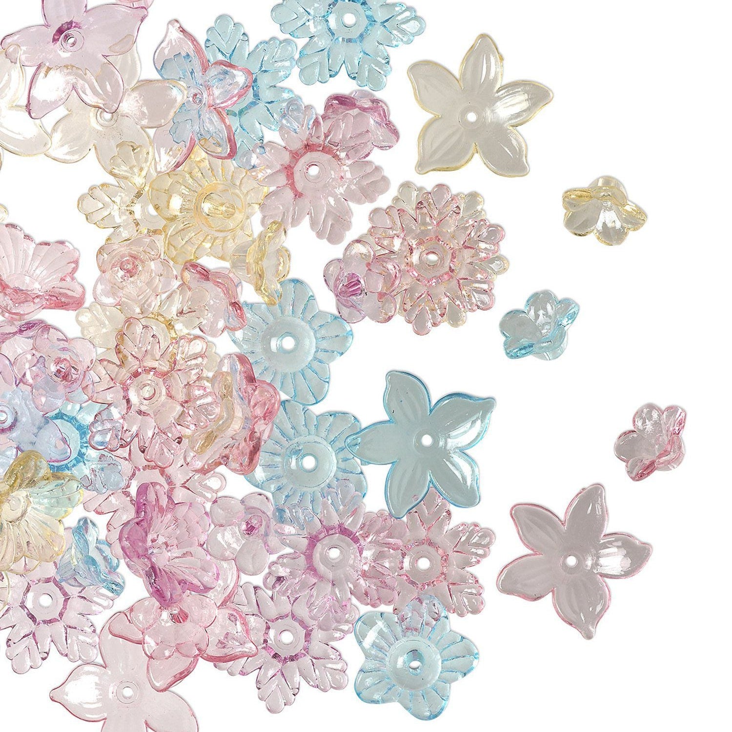 A collection of translucent plastic flower-shaped craft beads in pastel pink, light blue, pale yellow, and clear white, scattered on a plain white background.