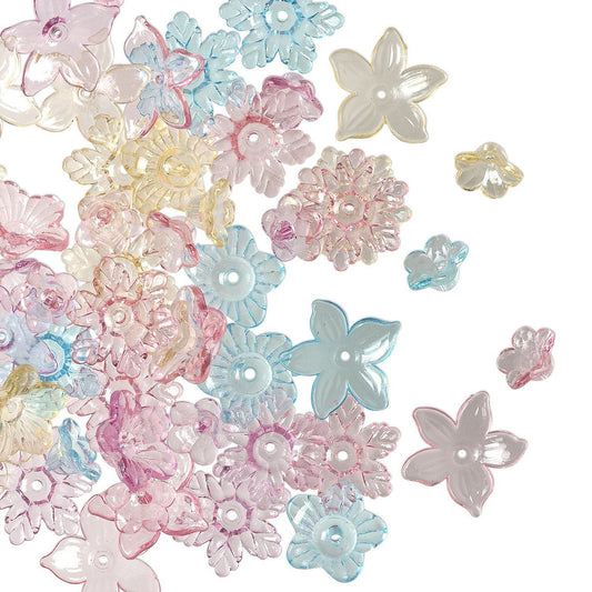A collection of translucent plastic flower-shaped craft beads in pastel pink, light blue, pale yellow, and clear white, scattered on a plain white background.