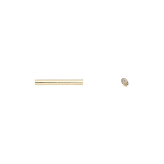 A pair of  gold beads on a plain white background, consisting of a straight cylindrical rod and a small cylindrical cap or end piece.