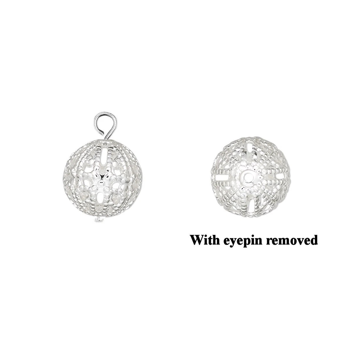 Two views of a silver filigree ball charm pendant on a white background, with one view showing a loop at the top and the other showing a cross-shaped cutout, with the text 'With eyepin removed' below the right view.