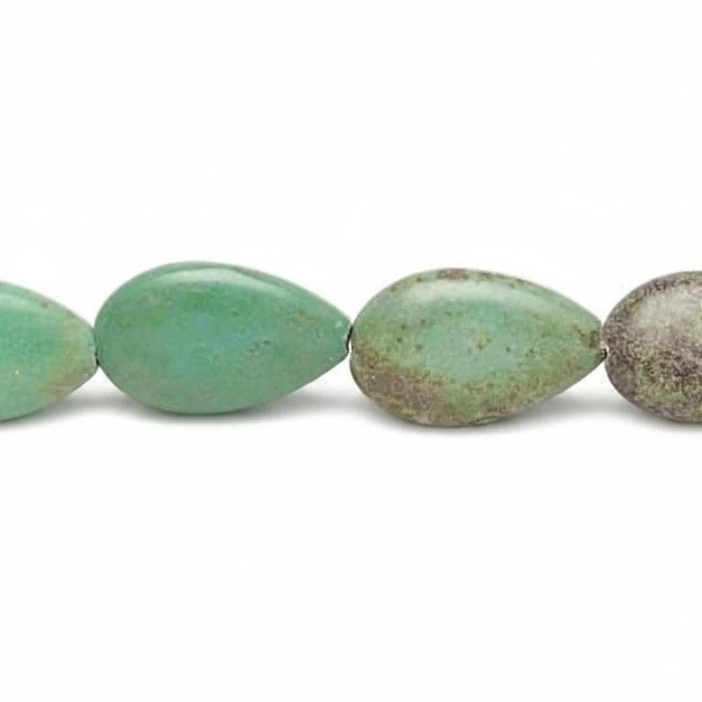 A close-up of a strand of teardrop-shaped beads in a light green stone with natural earthy brown and gray weathered edges, shown against a plain white background.