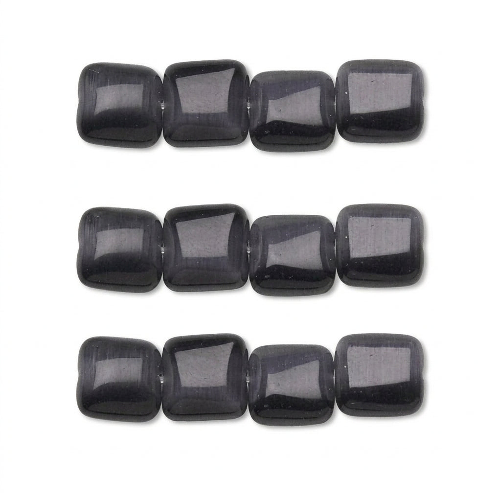 Three horizontal strands of polished black rectangular beads with rounded corners, shown against a plain white background.