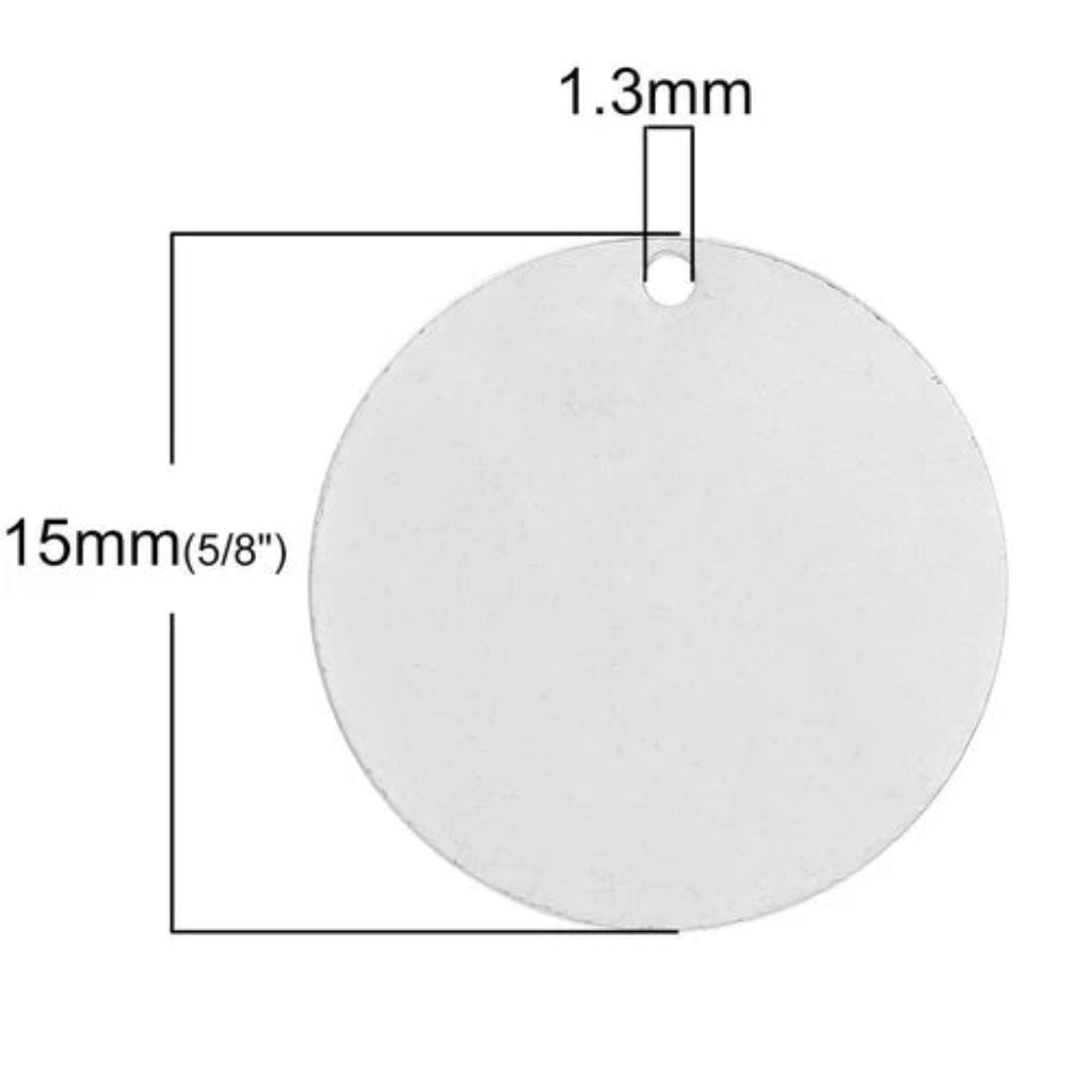 A plain round white tag or label with a small hole near the top, shown with dimension lines and text indicating a diameter of 15mm (5/8") and a hole width of 1.3mm on a white background.