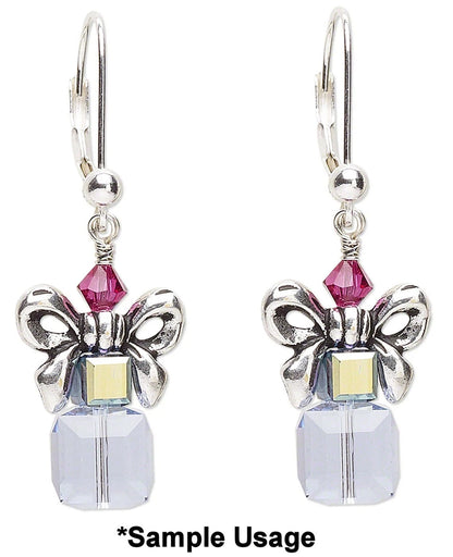 Silver bow-shaped earrings with pink gemstones and clear crystal drops on a white background.