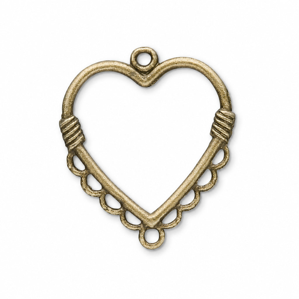 An antique bronze heart-shaped metal jewelry finding or connector charm with a textured finish, featuring a top loop, two spiral wrap details, and a scalloped lower edge with circular cutouts.