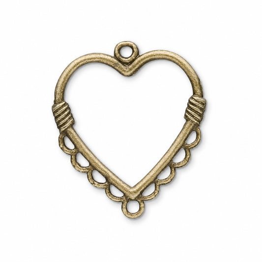 An antique bronze heart-shaped metal jewelry finding or connector charm with a textured finish, featuring a top loop, two spiral wrap details, and a scalloped lower edge with circular cutouts.