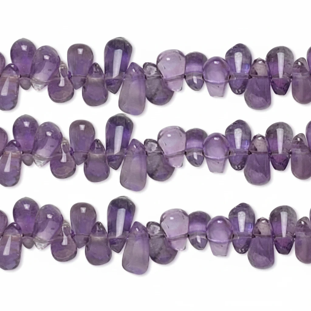 Three horizontal strands of faceted purple amethyst beads on a plain white background.