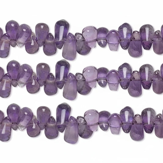Three horizontal strands of faceted purple amethyst beads on a plain white background.
