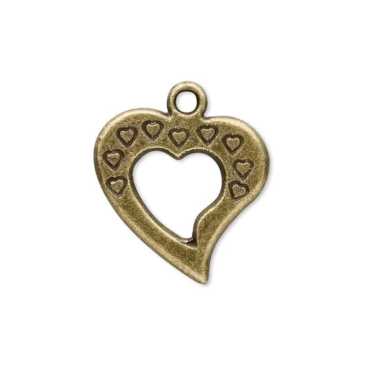 An antique bronze heart-shaped jewelry charm with a cutout center and small heart engravings, shown on a plain white background.