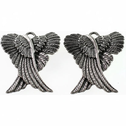 A pair of silver-toned metal wing charms with textured feather details and hanging loops at the top, shown on a plain white background.