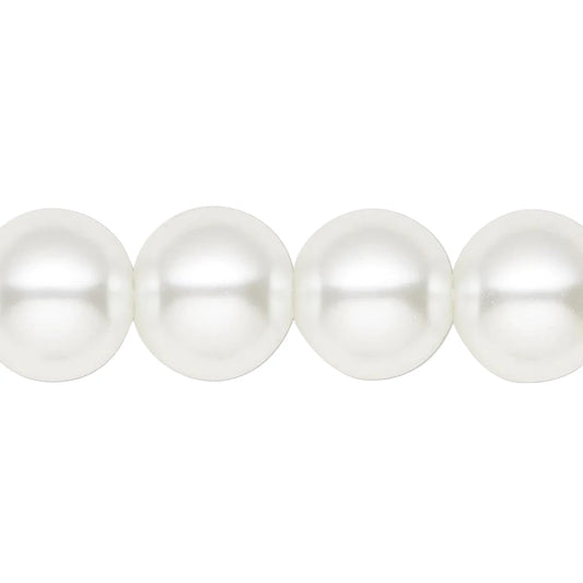 A close-up of four glossy white pearl beads aligned horizontally against a plain white background.