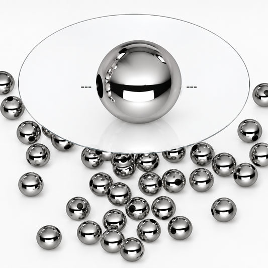 A shiny silver metallic ball bead shown in the center with several smaller matching silver beads scattered around it on a white background.