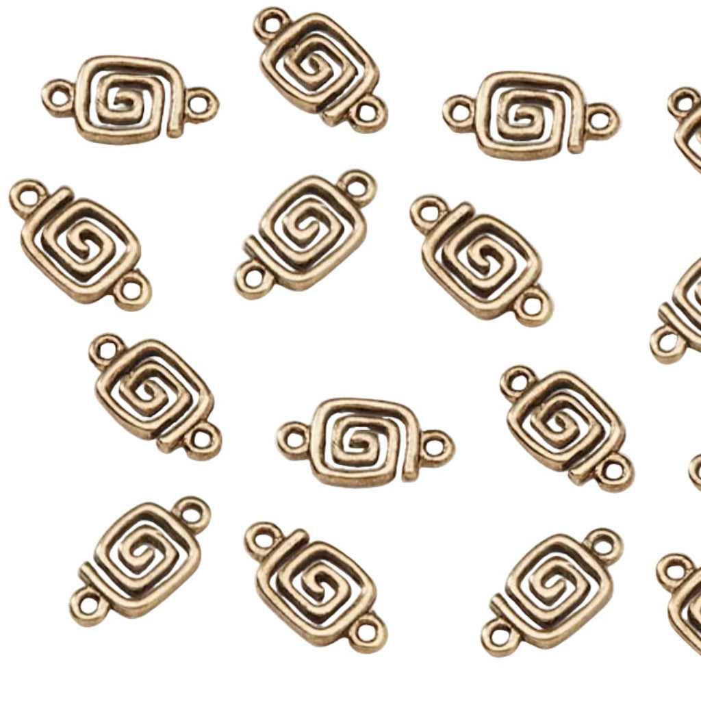 Twelve small spiral-shaped metal jewelry findings with loop ends, arranged on a plain white background. The metal has an antique bronze or gold-toned finish.